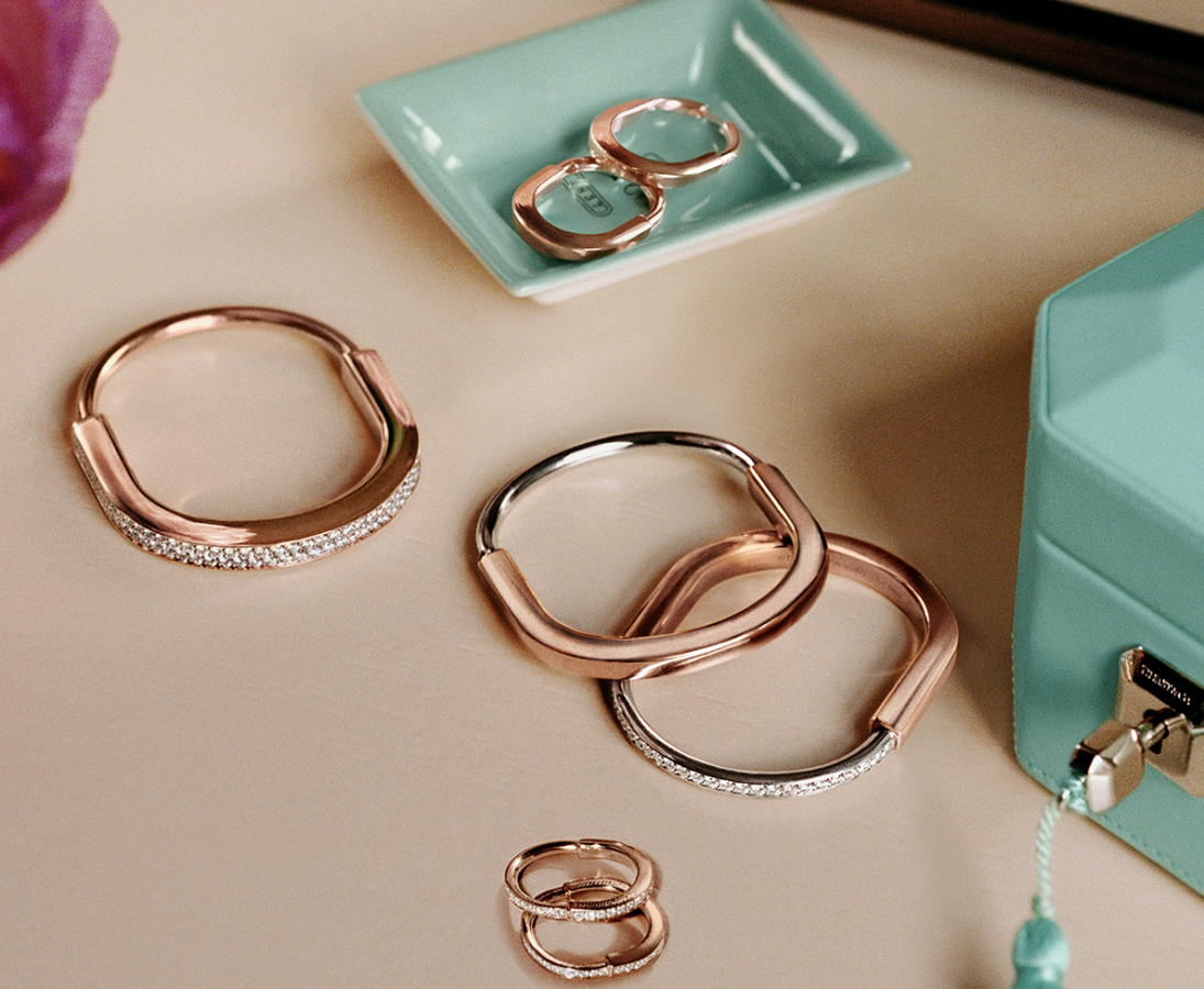 Tiffany Lock bangle in 18k rose and white gold with half pavé diamonds. Photo Credit: Tiffany & Co.