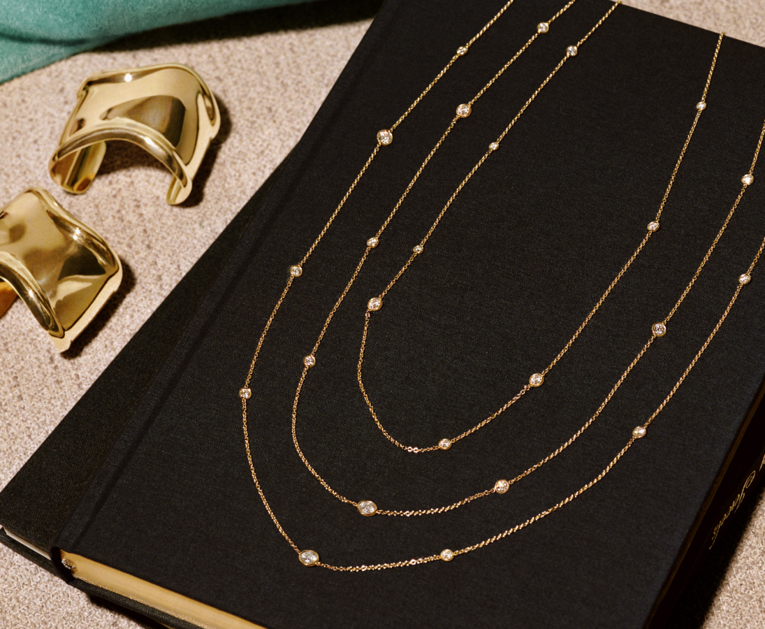Elsa Peretti® Diamonds by the Yard® sprinkle necklaces in 18k yellow gold with diamonds, 72″. Photo Credit: Tiffany & Co.