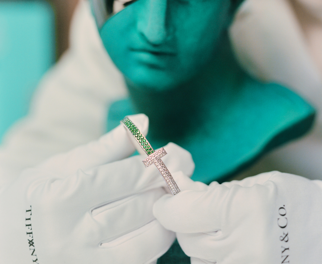 Tiffany & Arsham Studio Limited-Edition T1 Bangle in 18K White Gold with Tsavorites and Diamonds and the Amalgamated Bust. Photo Credit: Tiffany & Co.