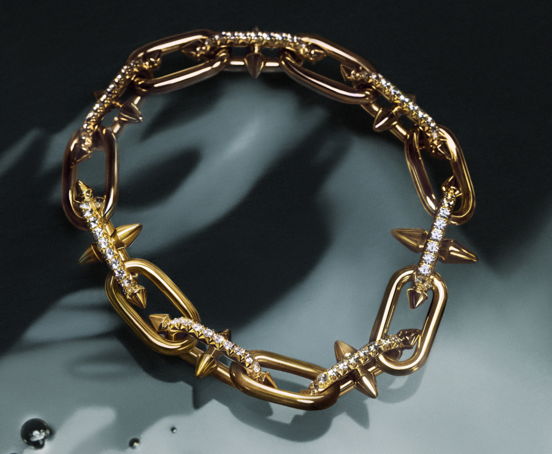 Tiffany Titan by Pharrell Williams medium link clasp necklace in 18k yellow gold with pavé diamonds. Photo Credit: Tiffany & Co.
