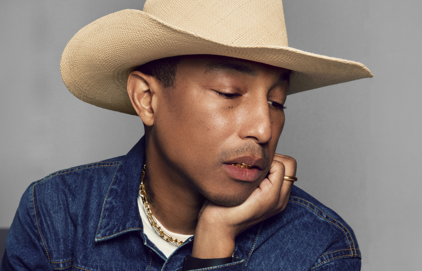 Tiffany Titan by Pharrell Williams medium link clasp necklace in 18k yellow gold with pavé diamonds. Photo Credit: Tiffany & Co.