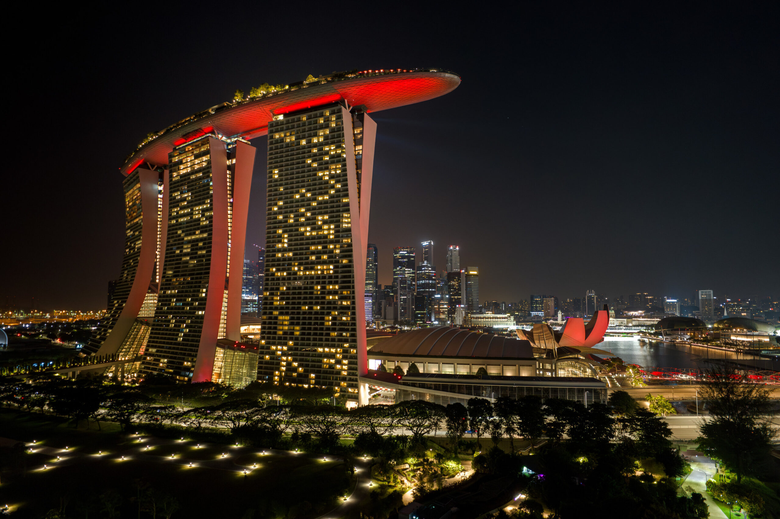 Marina Bay Sands’ iconic façade will be transformed and illuminated with a vibrant hue of Ferrari red. Photo: Courtesy of Marina Bay Sands