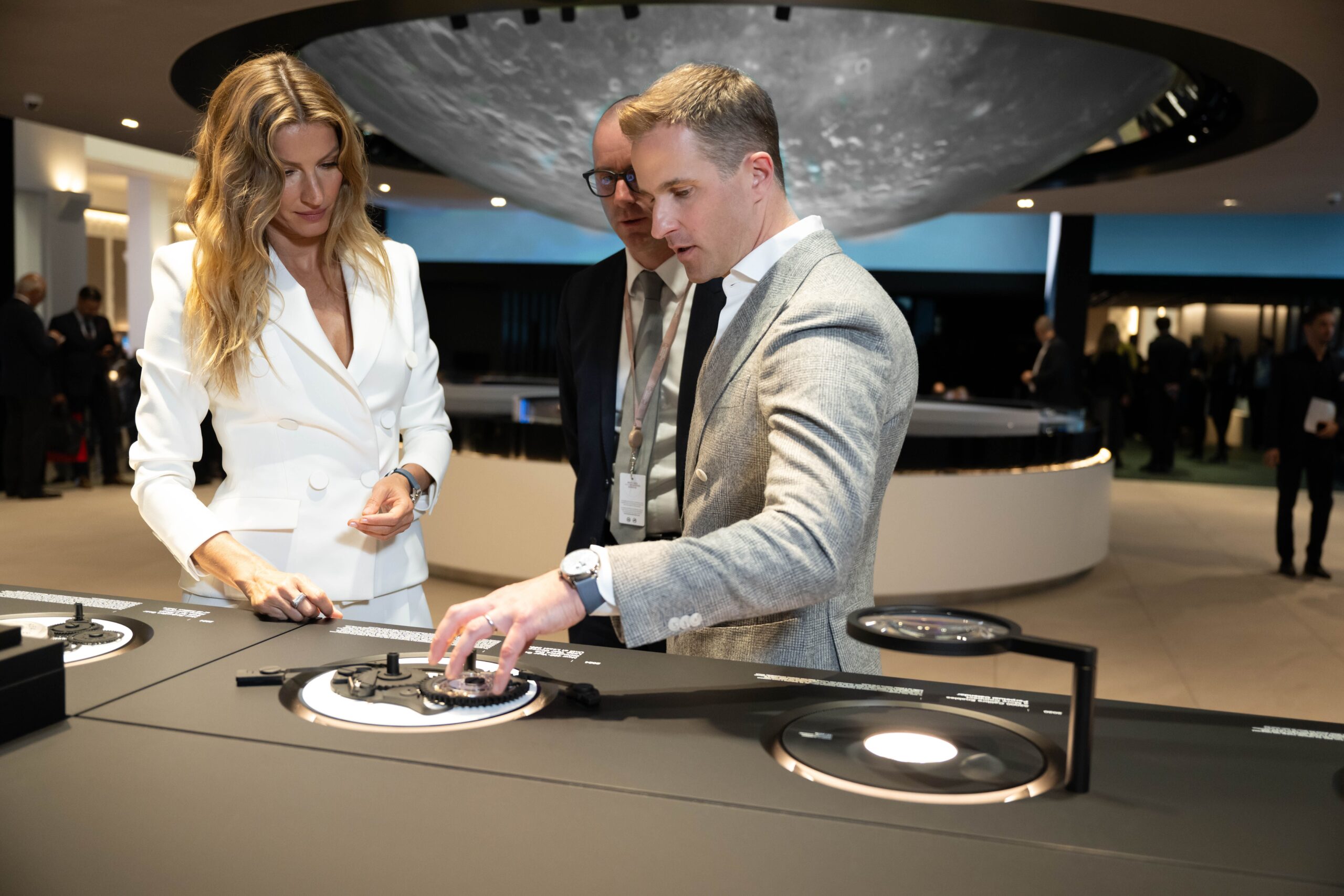 GISELE BÜNDCHEN, MARKUS BÜHLER AND CHRIS GRAINGER-HERR AT WATCHES AND WONDERS GENEVA