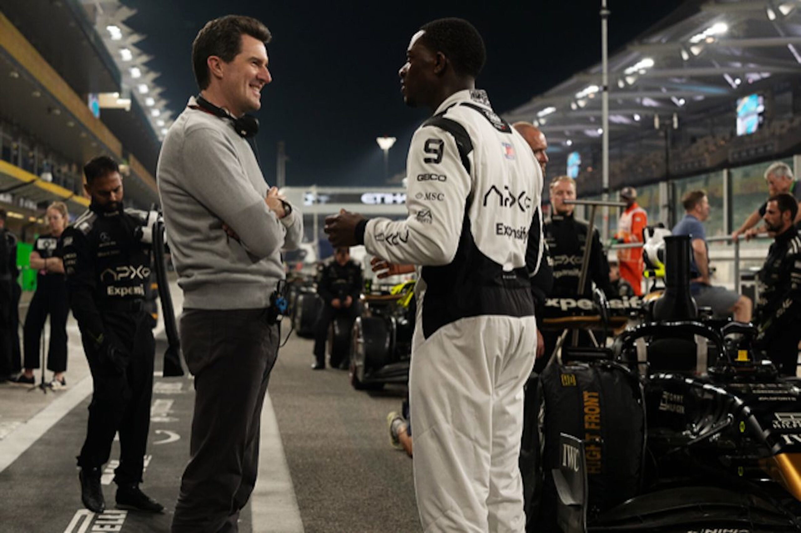 Director Joe Kosinski and star Damson Idris on the set of Apple Original Films’ “F1” at the Yas marina Circuit, home of the Abu Dhabi Grand Prix (Photo courtesy of Apple)